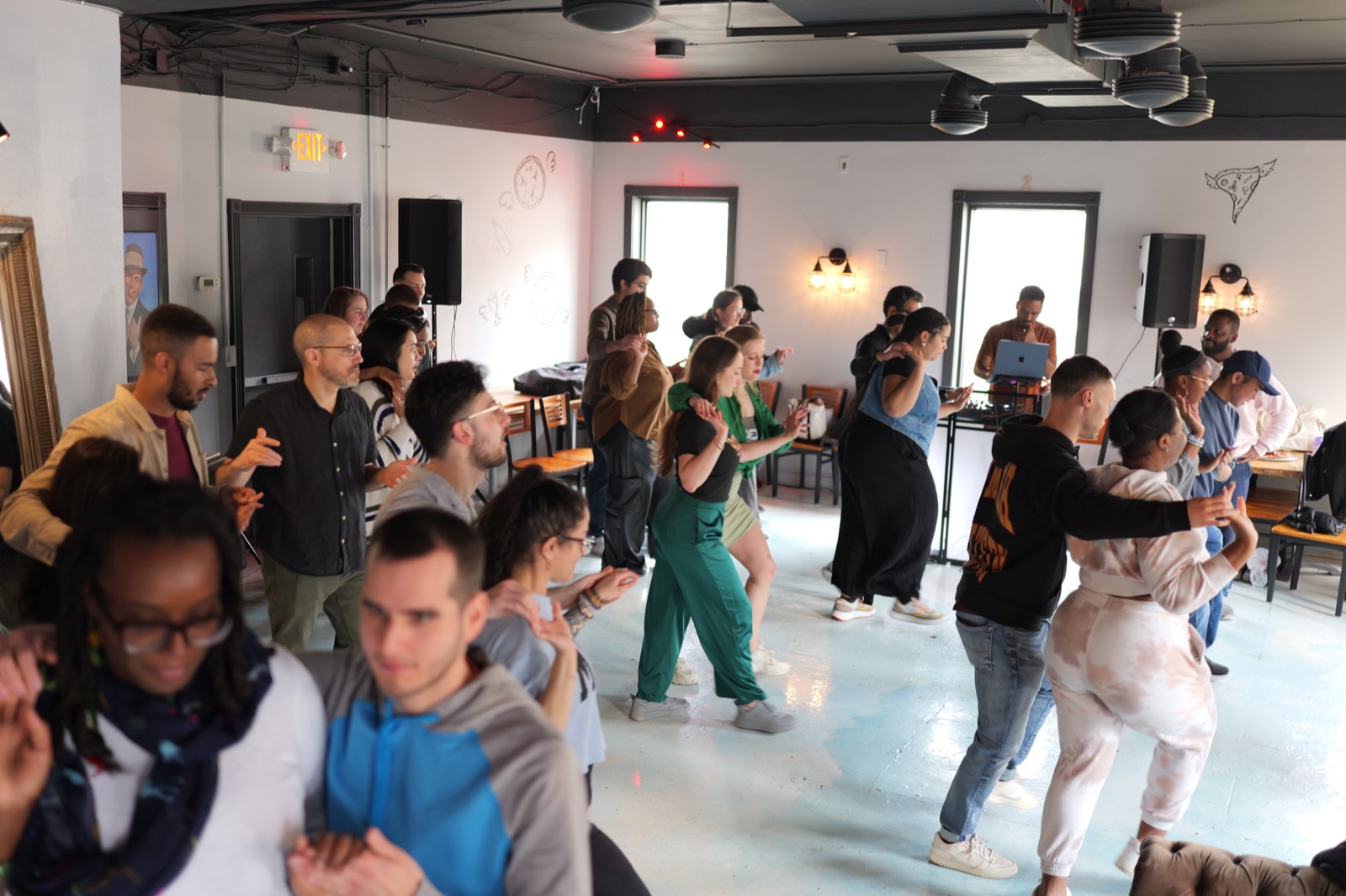 Bayside Bachata dancers learning together during a class