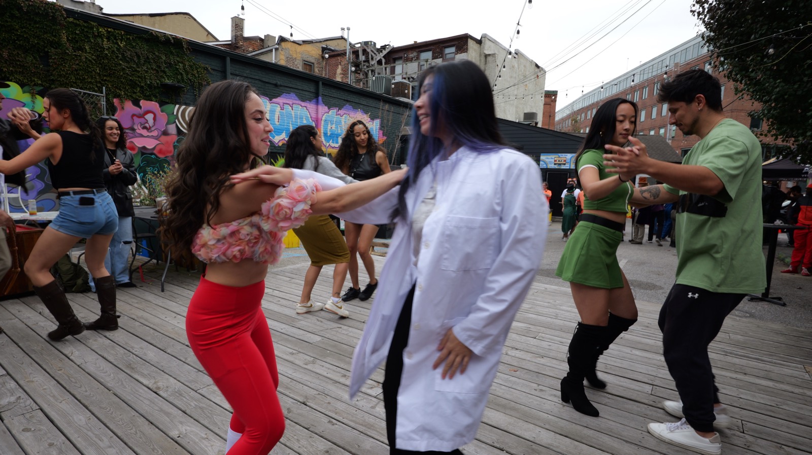 People partner dancing at a Bayside Bachata event